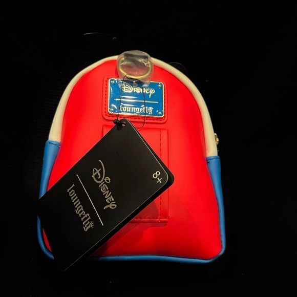 Loungefly Disney Pinocchio Figural Wristlet 
New & RARE!!!!